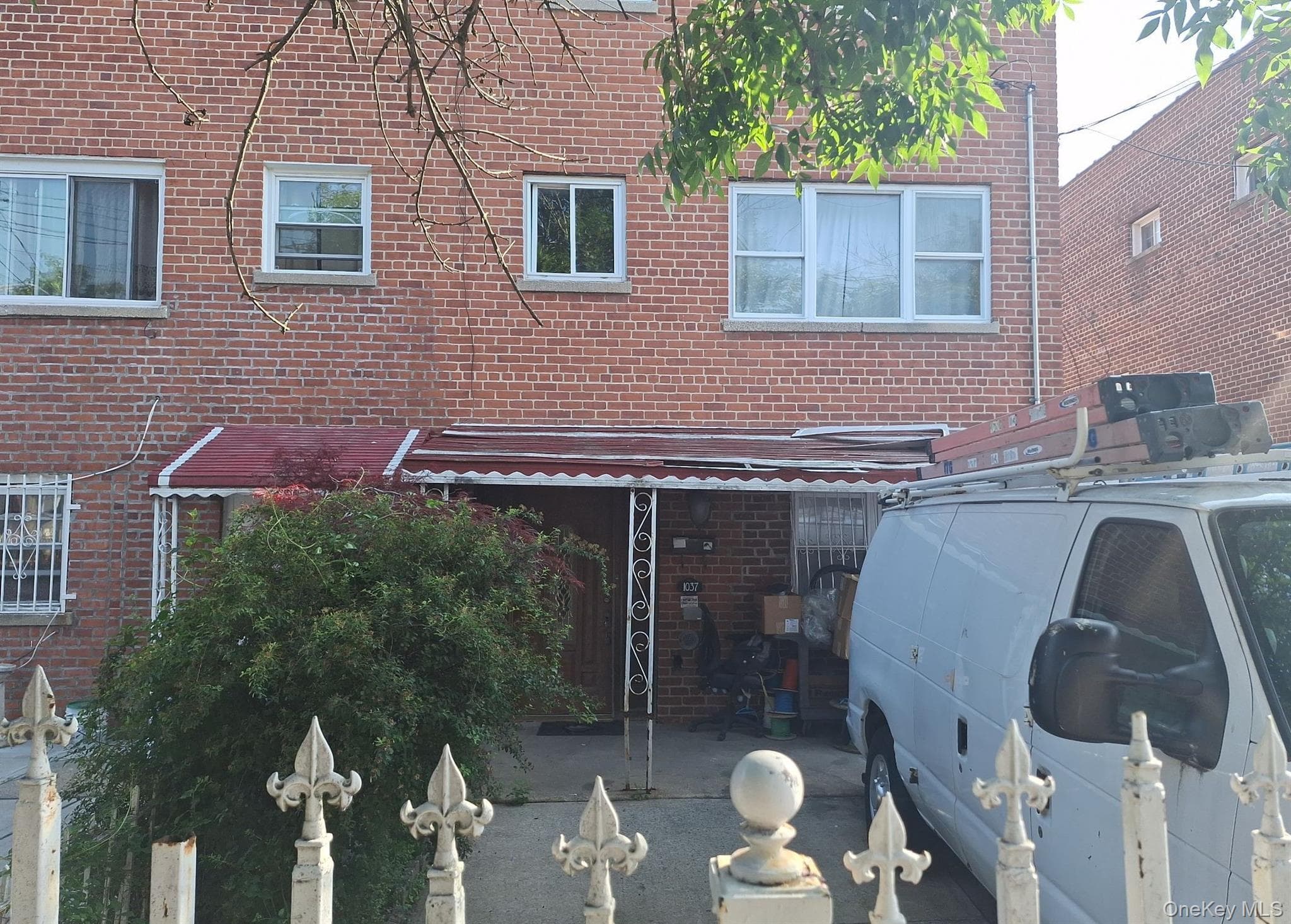 1037 E 219th Street photo 1